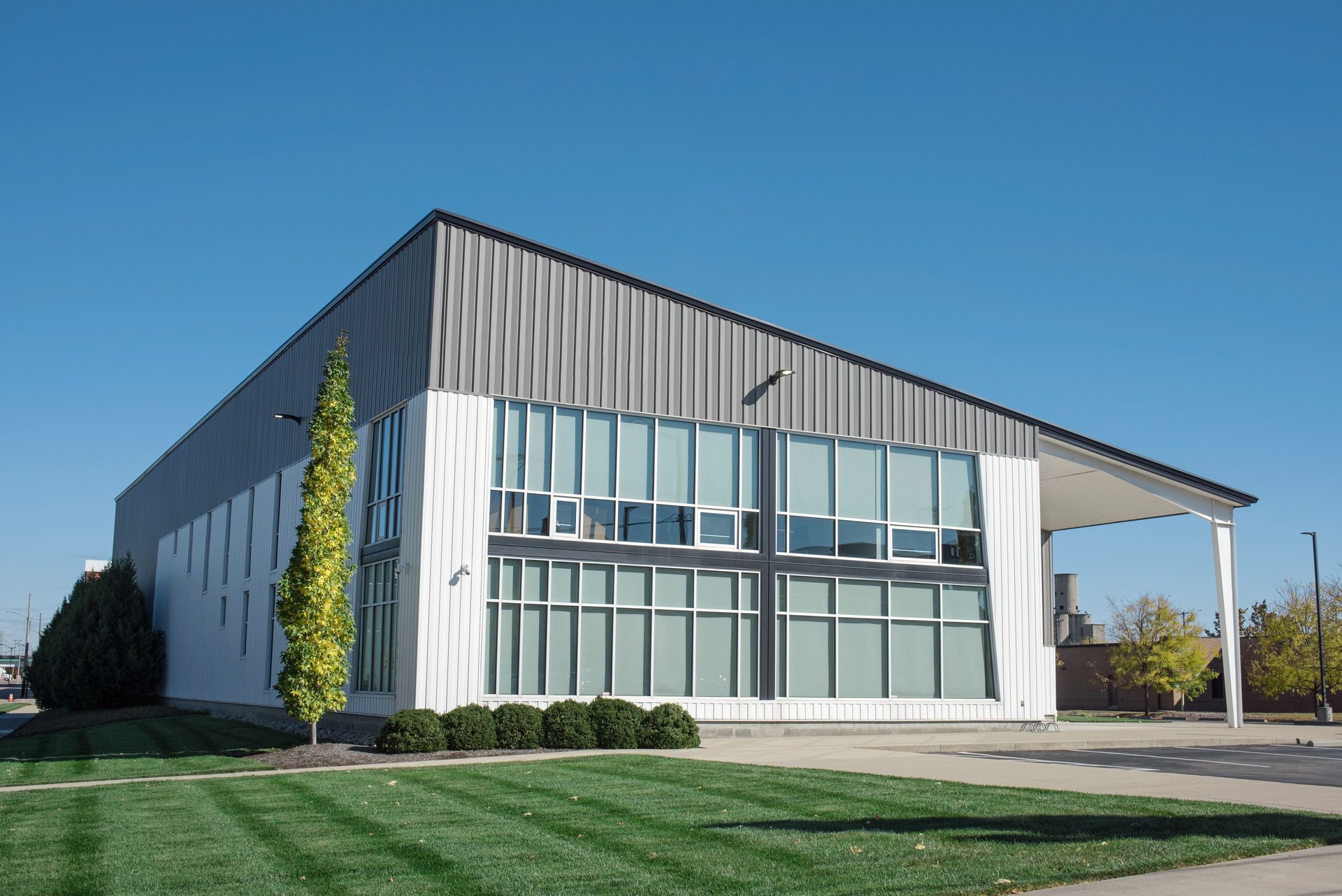Gray and White Modern Building with Front Windows